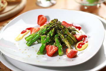 Image showing Caramelized asparagus with strawberry