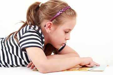 Image showing Little girl reading