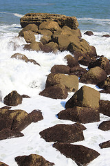 Image showing waves on rocks