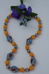 Image showing Necklace in yellow,turqouise and red colours