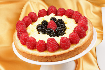 Image showing Custard tart with raspberries and blackberries