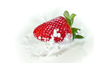 Image showing strawberry splashing into milk