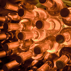 Image showing wine bottles stacked up