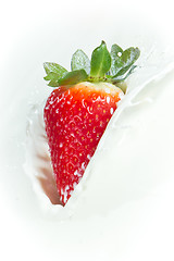 Image showing strawberry splashing into milk