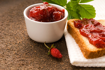 Image showing Wild strawberry jam with toast