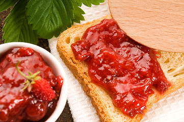 Image showing Wild strawberry jam with toast