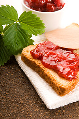 Image showing Wild strawberry jam with toast