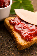 Image showing Wild strawberry jam with toast