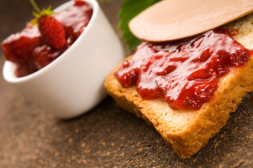 Image showing Wild strawberry jam with toast