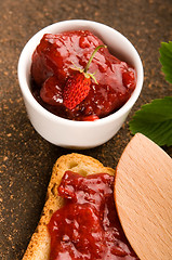 Image showing Wild strawberry jam with toast