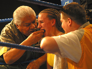 Image showing female boxer in corner