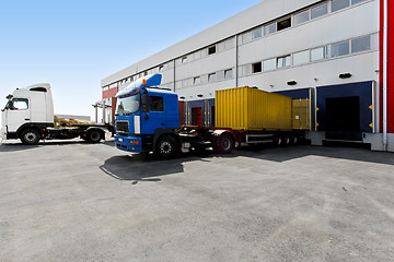 Image showing Unloading trucks