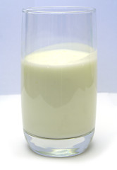 Image showing Glass with kefir on smooth white table