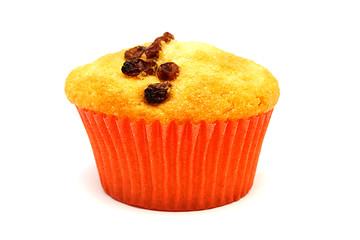 Image showing Tasty yellow muffin with many brown raisins