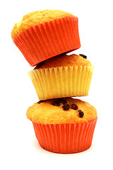 Image showing Tasty yellow muffins on standig each other