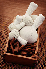 Image showing cinnamon massage stamps