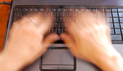 Image showing Hands on keyboard, fast typing