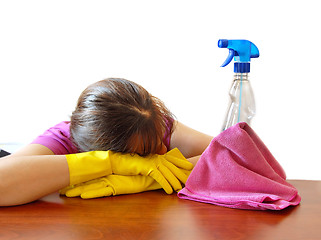 Image showing Bored cleaning