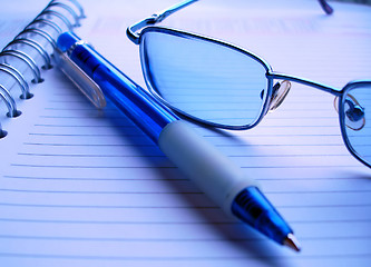 Image showing pencil and glasses