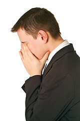 Image showing Businessman hiding his face in shame