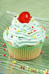 Image showing Cupcake with candied cherry