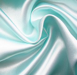 Image showing Smooth elegant blue silk as background