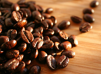 Image showing Heap of burnt arabica coffee beans 