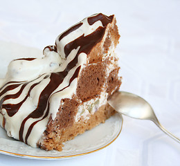 Image showing Chocolate and cream cake on the plate