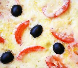 Image showing Omelette with tomatoes, olives and cheese 