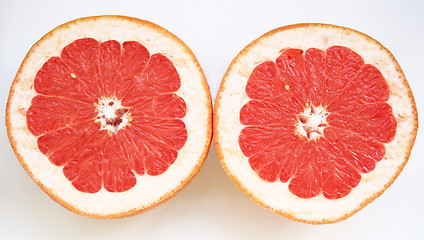 Image showing Grapefruit halves close-up on the white background