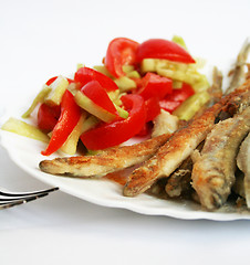 Image showing Fish -smelt in flour crust appetizer with salad on the plate