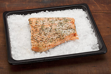 Image showing salmon baked on rock salt