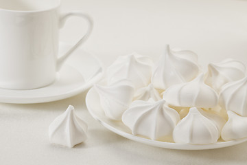 Image showing meringue cookies and coffee