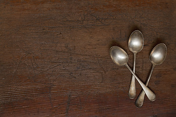 Image showing vintage silver spoons with patina