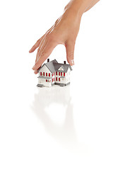Image showing Womans Hand Choosing A Home on White