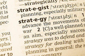 Image showing The word strategy in the old dictionary