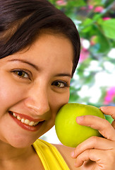 Image showing Young Lady About To Eat An Apple