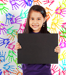 Image showing Young Cheerful Girl With A Blank Board