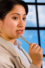 Image showing Business Woman In Her Office Thinking