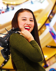 Image showing Smiling Teenager in a Shopping Center