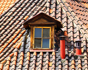 Image showing old tiles roof and window