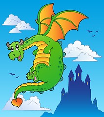 Image showing Flying fairy tale dragon near castle