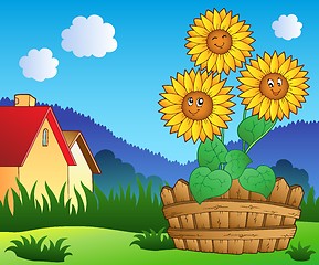 Image showing Meadow with three cute sunflowers