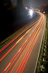 Image showing road with car traffic at night with blurry lights