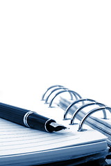 Image showing business organizer and pen