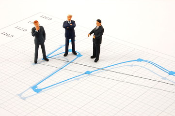 Image showing business people on chart background