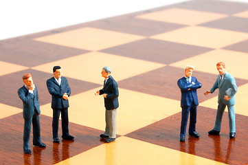 Image showing business man on a chess board