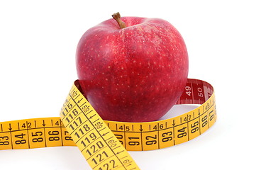 Image showing Apple and measuring tape on white