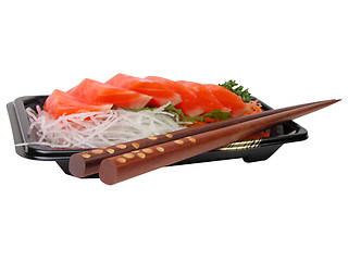 Image showing Salmon sashimi and chopsticks