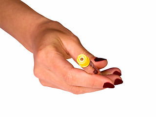 Image showing Hand with insulin vial